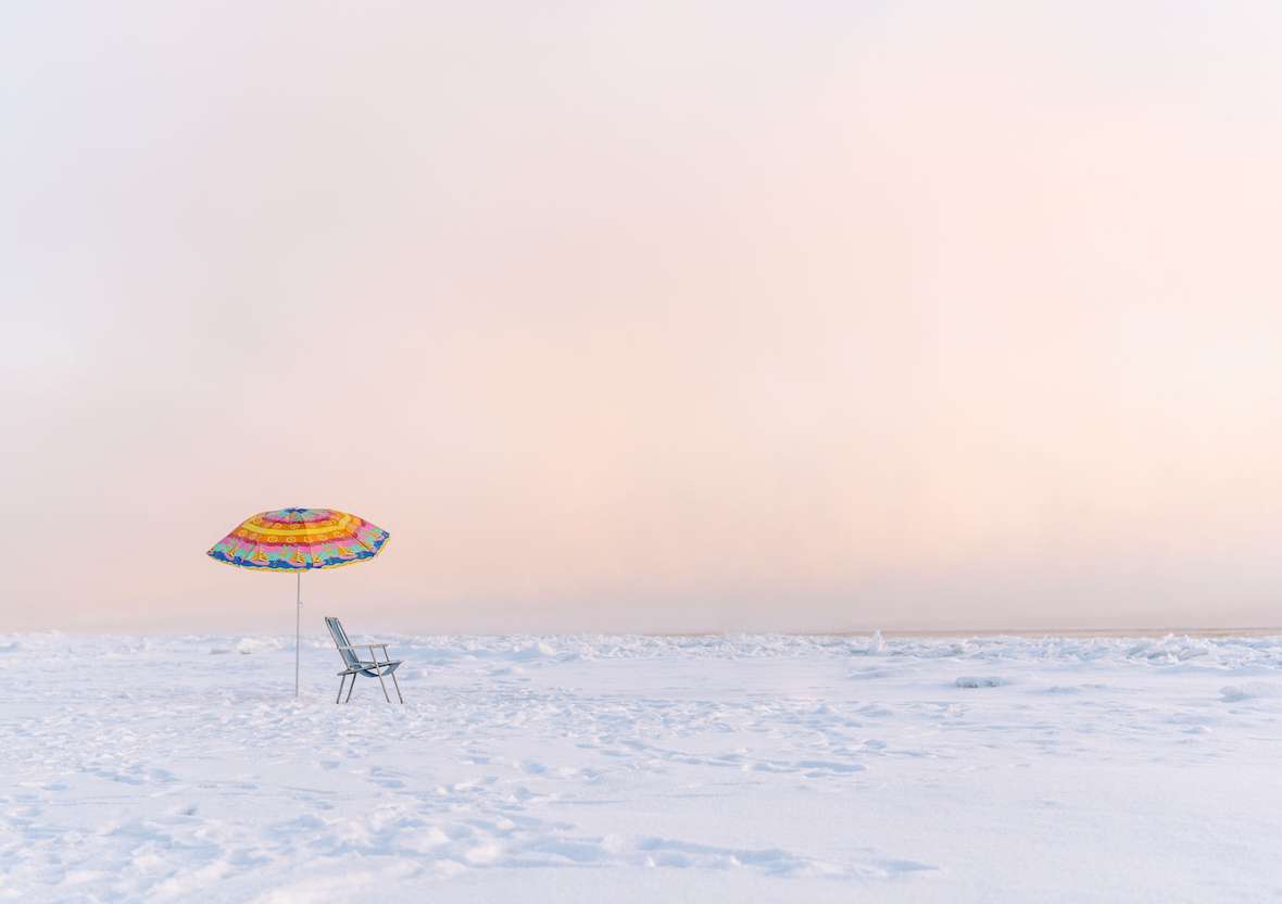 Astronaut Standing At Umbrella In Winter